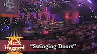 Merle Haggard with Dwight Yoakam performing 'Swinging Doors', live.